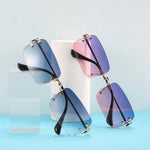 Modern rimless sunglasses with angular lenses