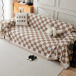 Duvet cover with checked pattern, color block design, and fringes