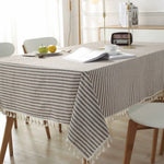 Stylish striped tablecloth with tassels made of microfiber