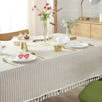 Stylish striped tablecloth with tassels made of microfiber