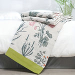 Natural cotton blanket with floral patterns