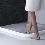 Flexible water barrier for showers