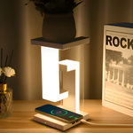 Schwebende LED Tischlampe mit kabelloser Ladefläche – Modernes Design