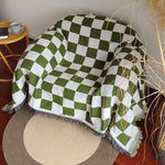 Duvet cover with checked pattern, color block design, and fringes
