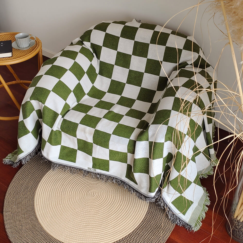 Duvet cover with checked pattern, color block design, and fringes