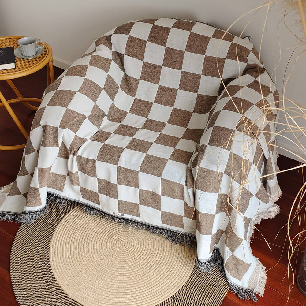 Duvet cover with checked pattern, color block design, and fringes