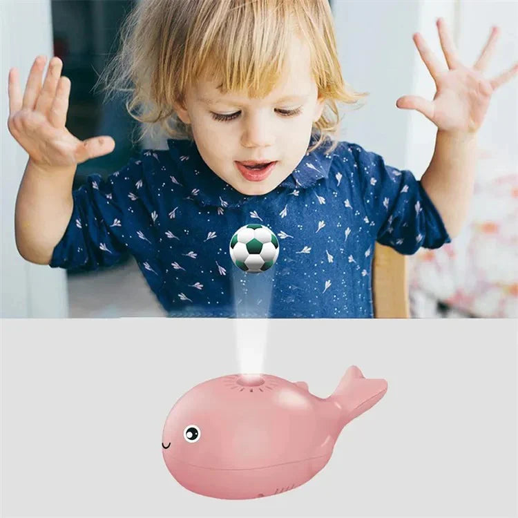 Floating ball and whale-shaped toy