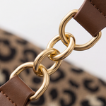 Elegant leopard print pouches with gold chain