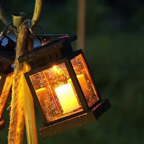 Solar lamp with flickering LED light, weatherproof