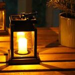Solar lamp with flickering LED light, weatherproof