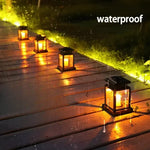 Solar lamp with flickering LED light, weatherproof