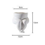 Elegant ceramic vase with unique leg design
