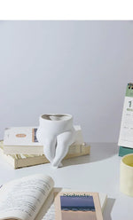 Elegant ceramic vase with unique leg design