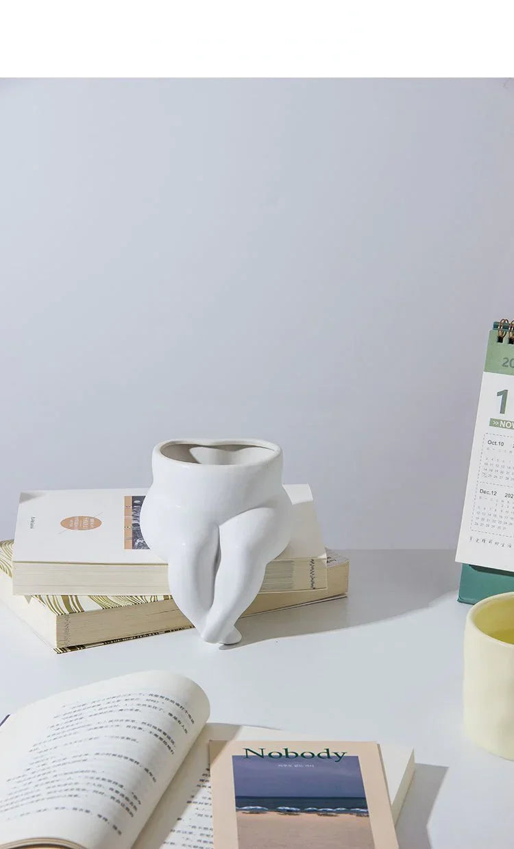 Elegant ceramic vase with unique leg design