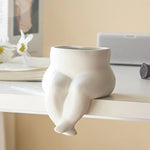 Elegant ceramic vase with unique leg design