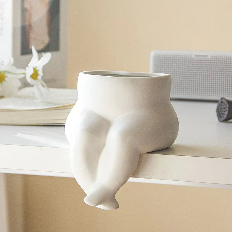 Elegant ceramic vase with unique leg design