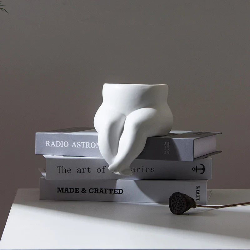 Elegant ceramic vase with unique leg design