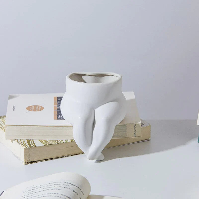 Elegant ceramic vase with unique leg design