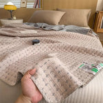Reversible cotton blanket in a modern design
