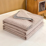 Reversible cotton blanket in a modern design