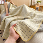 Reversible cotton blanket in a modern design