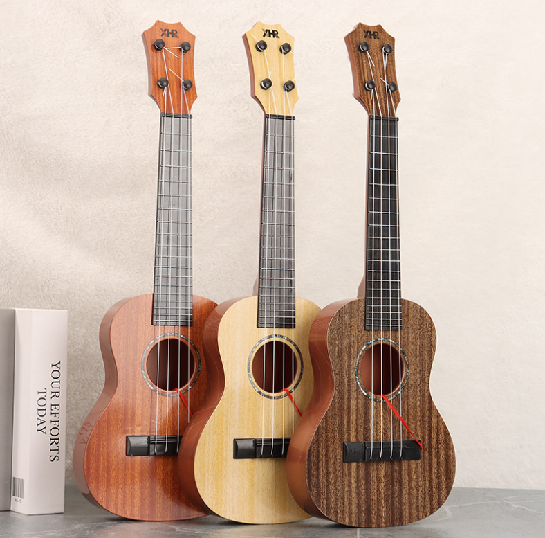Wundervolle Montessori Ukulele für kleine Musiker