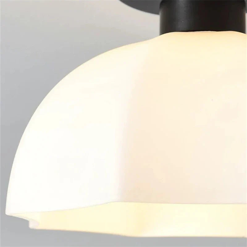 Elegant pendant lamp made of ceramic and glass for modern living