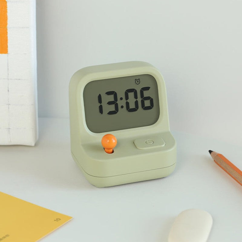 Retro gaming console with alarm clock and timer function