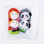 Plush socks and bracelet for babies with sensory elements