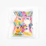 Plush socks and bracelet for babies with sensory elements