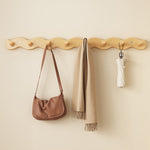 Elegant natural wood wall coat rack for your hallway