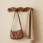Elegant natural wood wall coat rack for your hallway