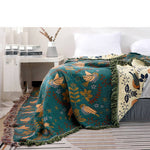 Reversible cotton blanket with floral and bird motif