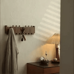 Primo - Eleganter Garderobenständer im Klavierdesign