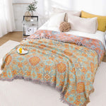 Comfortable, reversible Bohemian-style cotton blanket