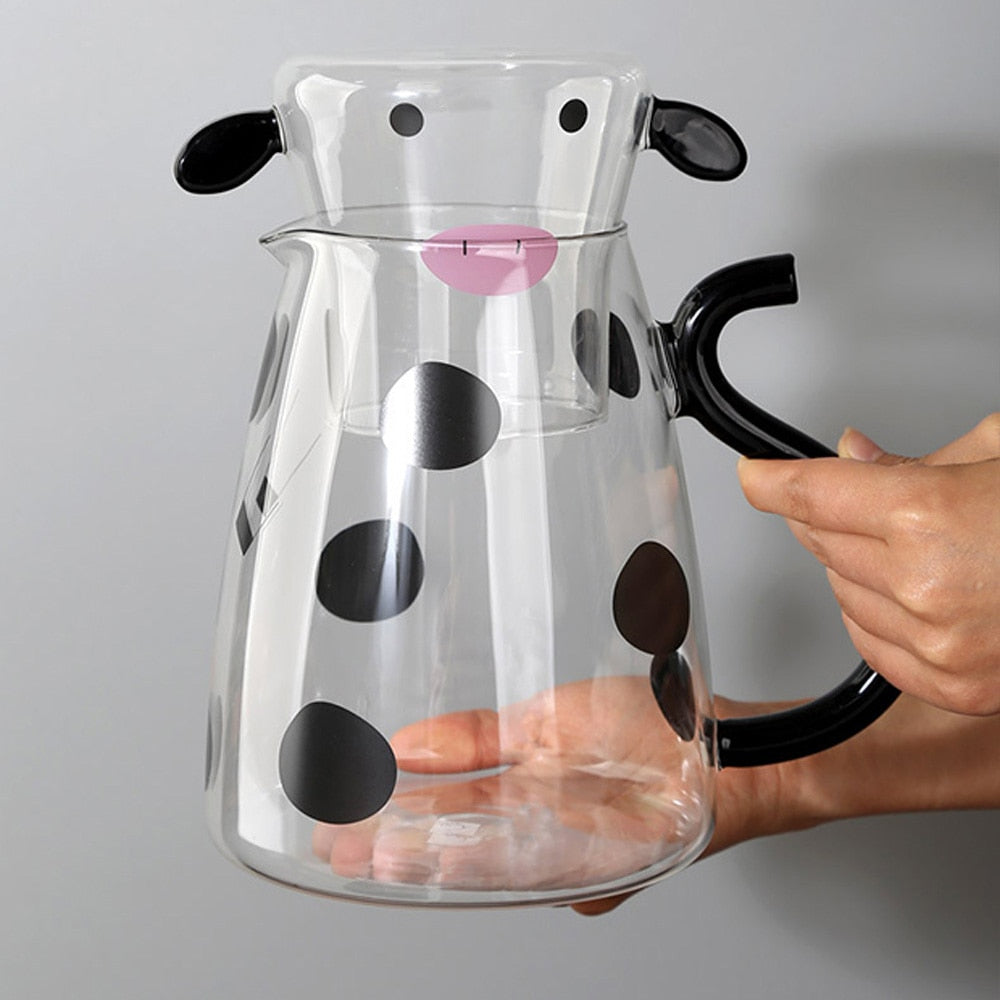Glass pitcher with cow design and mug