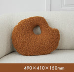 Fluffy pebble-effect cushions
