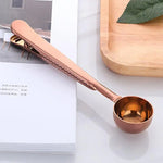 Coffee scoop with clip