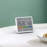 Multifunctional indoor climate station with clock and thermometer