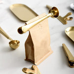 Coffee scoop with clip