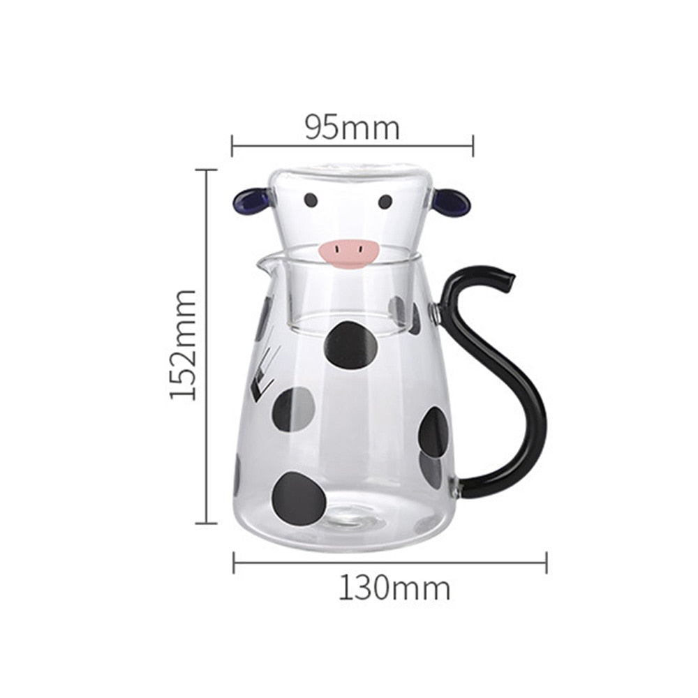 Glass pitcher with cow design and mug