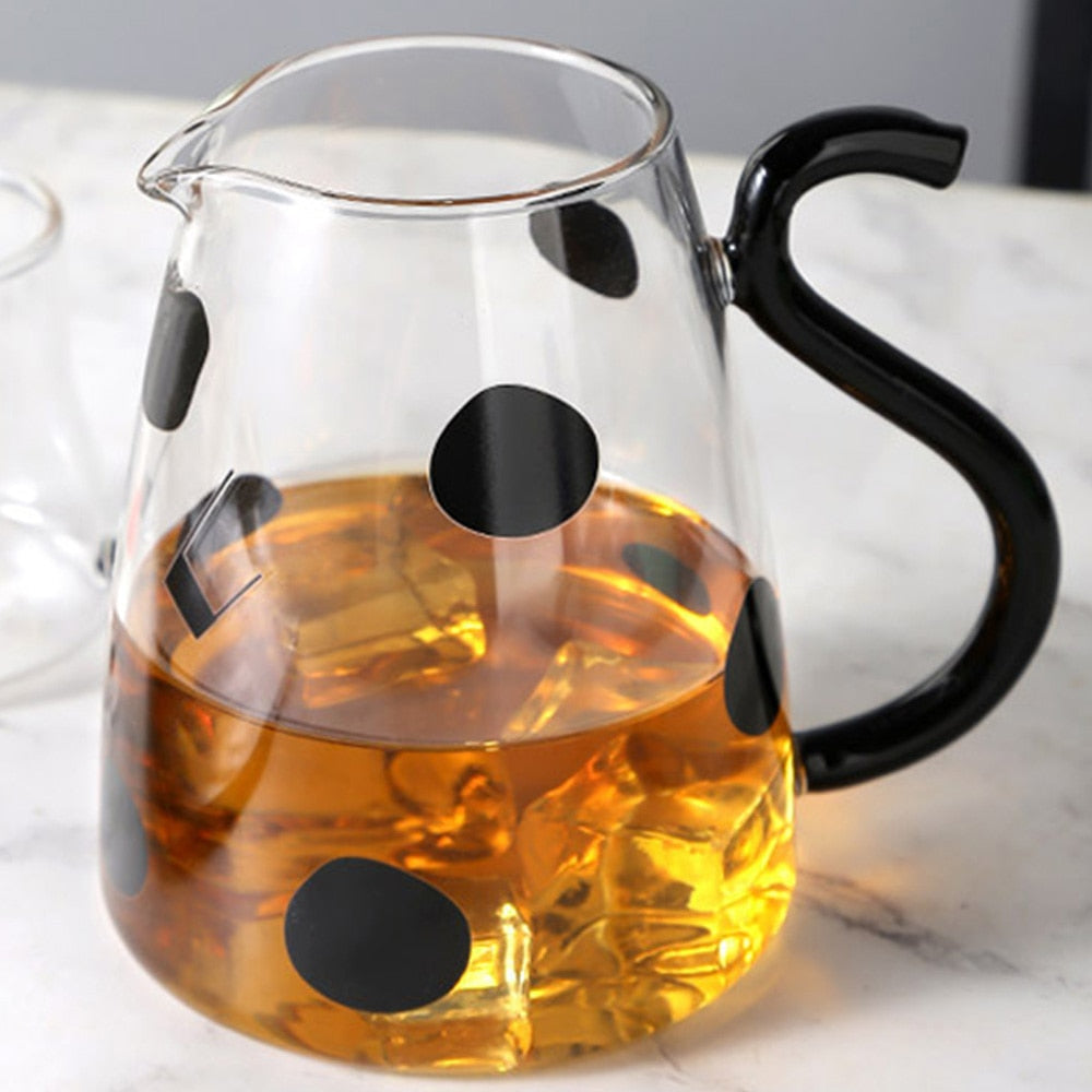 Glass pitcher with cow design and mug