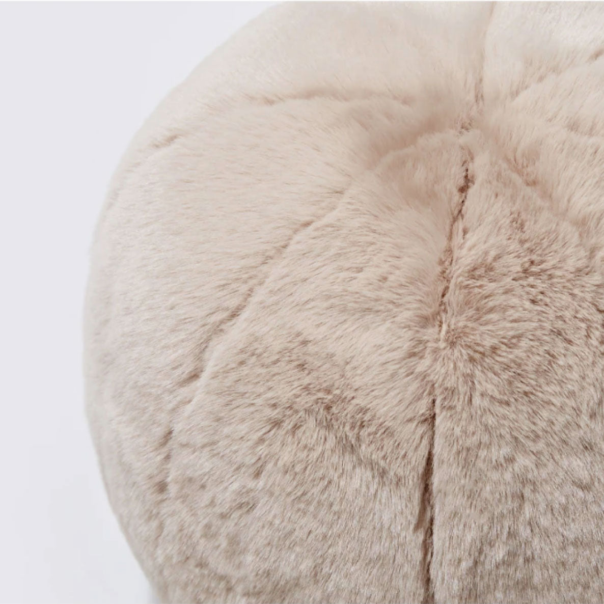 Round short-pile faux fur cushion