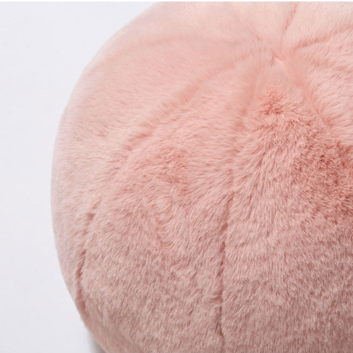 Round short-pile faux fur cushion
