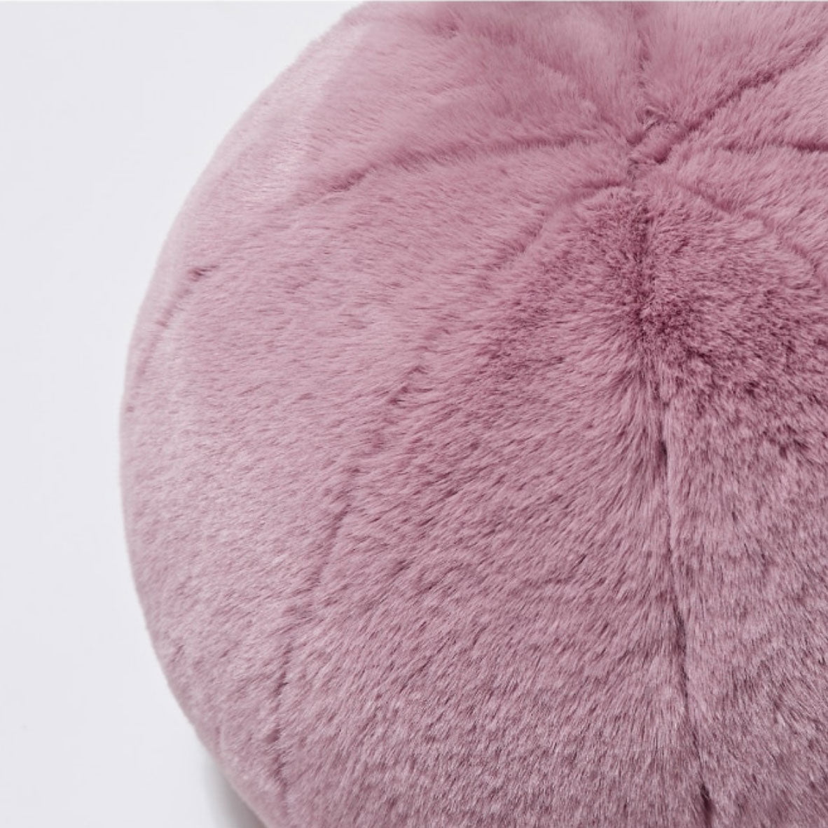 Round short-pile faux fur cushion