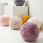 Round short-pile faux fur cushion