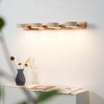 Elegante Wandlampe aus Travertin und Holz mit LED-Beleuchtung