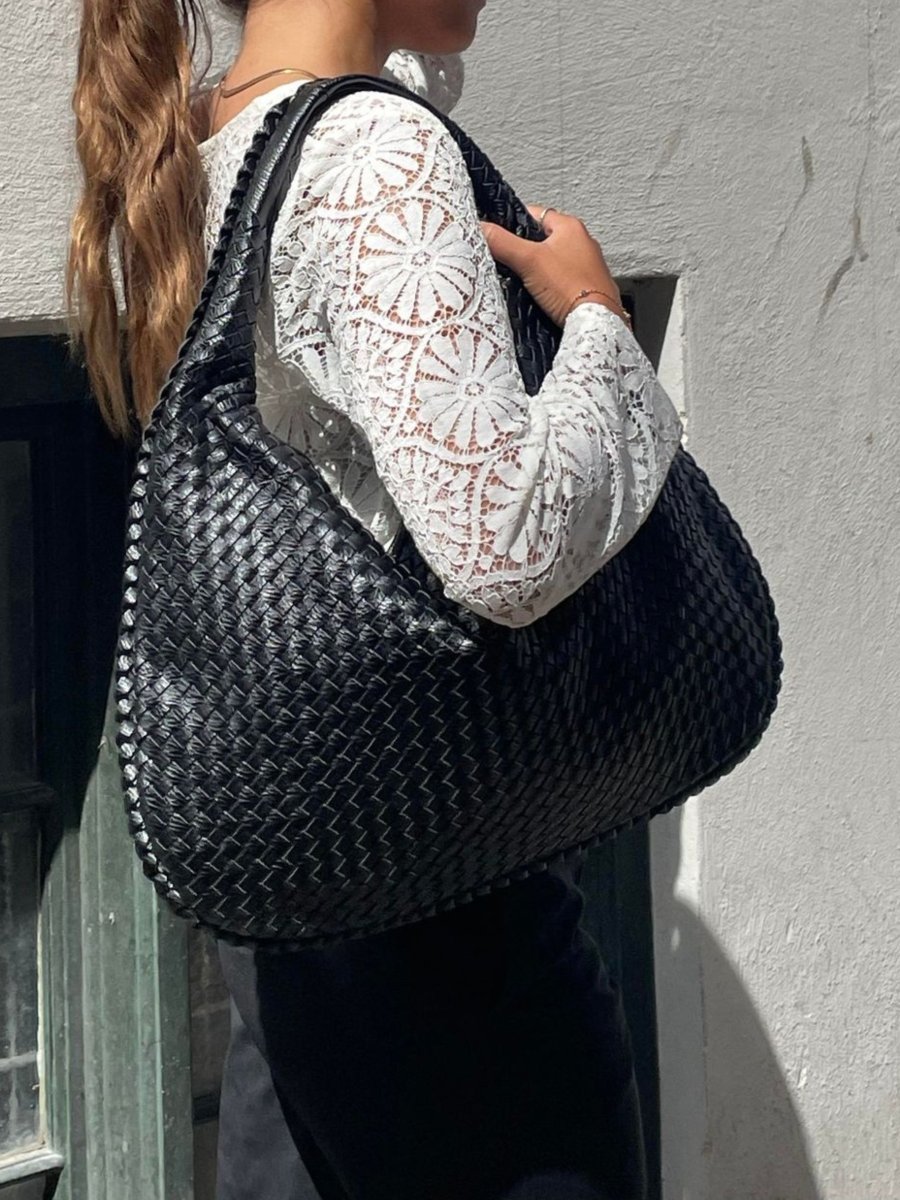 Elegant braided leather shoulder bag with secure zip closure