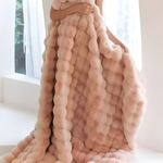 Vielseitige Decke für jedes Wetter mit Stil