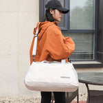 Duffel Bag Water-Resistant Multi-Pocket Padded Handles & Adjustable Strap